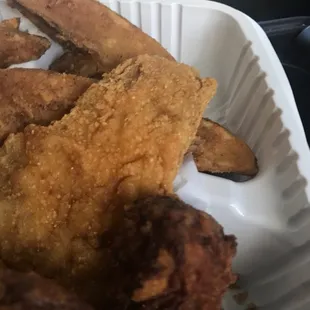 The chicken is burned... seems to be double fried.