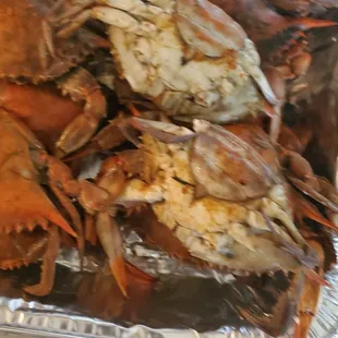 a tray of steamed crabs