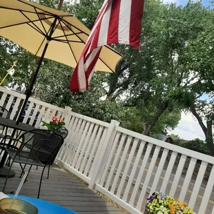 patio with table and umbrella