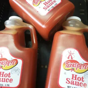 Bulk Texas Pete's gallon jugs. I prefer Frank's.