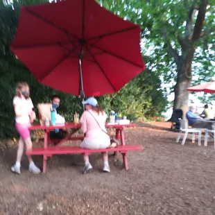 At least a dozen tables were there, mostly shady.  At least 4 Food Carts were open. No Alcohol sales.