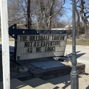 a sign on the corner of a street