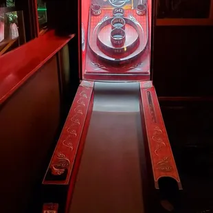 a pinball machine in a dark room