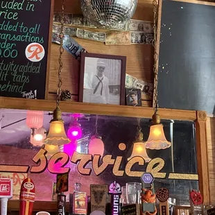 The photo of a sailor above the bar is the owner&apos;s Father.