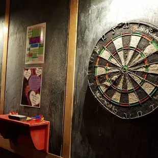 We have real dart boards and real darts that could put out an eye.