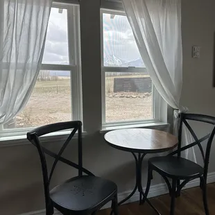 Nice table and chairs area to drink your morning coffee, enjoy a meal or journal.