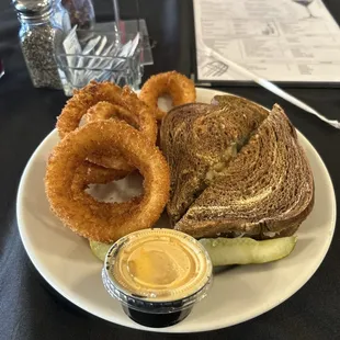 The Alderman sandwich and fresh onion rings with their special dipping sauce!