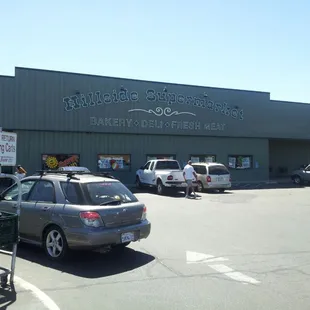 cars parked in front of the store