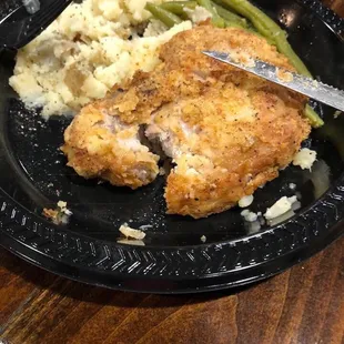 The pork chop, ate it right off the bone garlic mash and tender green beans