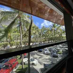 a view of a parking lot from a window