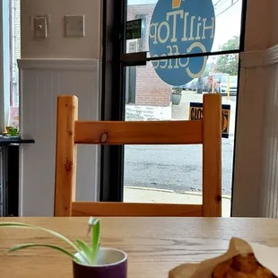 View toward the front door from a two-top