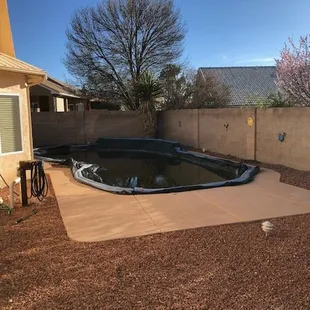 Directly behind house before Hilltop