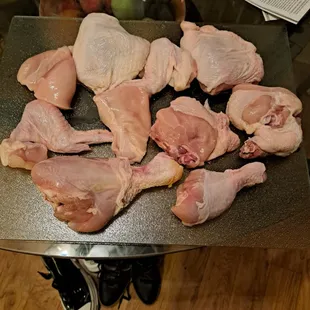 raw chicken on a cutting board