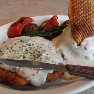 Chicken fried steak, mashed potatoes and grilled veggies