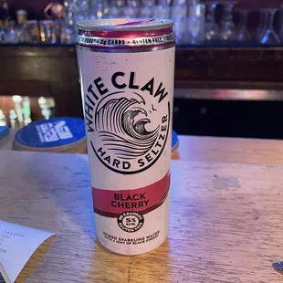 a can of beer on a table