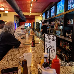 customers at the bar