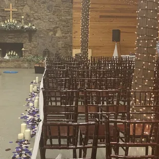 An aisle setup and mantelpiece decoration.