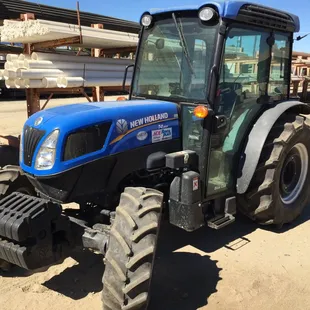 Farm Tractor with and without implements.