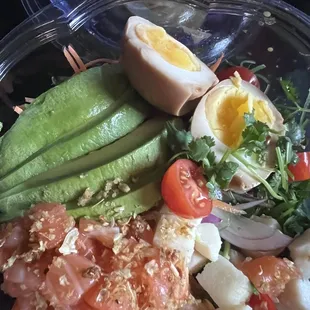 DIY POKE - salmon, hearts of palm, carrots, cucumber, avocado, egg, tomato, seaweed, cilantro, fried garlic -- Soooooo good !!