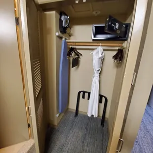 King room with a sofa bed: closet.