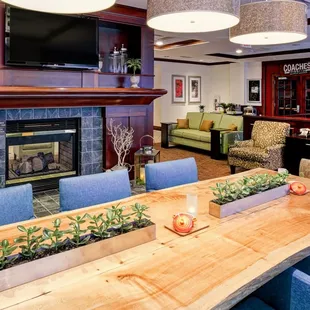 Unwind with co-workers by the communal table, and enjoy free property-wide WiFi.