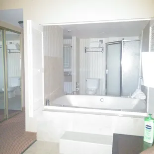 Jacuuzi suite... Ahhhhh *kicks feet up And places hands underneath head*