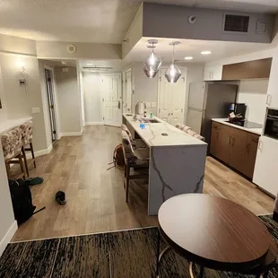 About all you can ask from a hotel living room kitchen