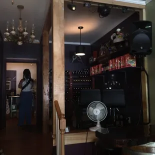 a woman standing in a wine cellar