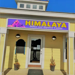 the front entrance of a restaurant