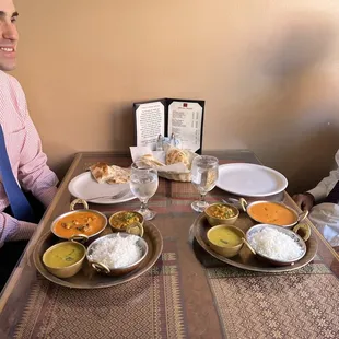two men sitting at a table