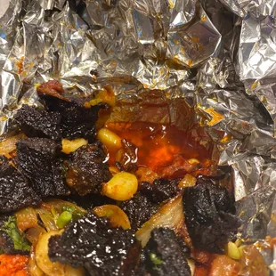 Sukuti that is over cooked and yes that is grease