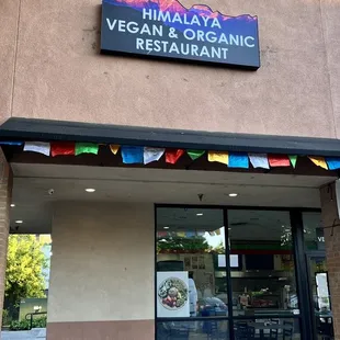 Exterior - the restaurant is tucked back in the shopping center.