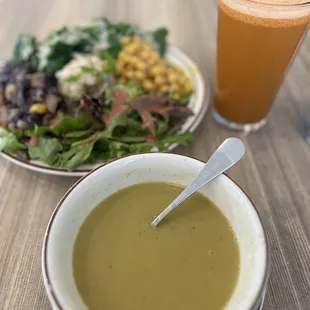 Green split pea &amp; veggie soup, moderate plate with fixings of the day (all super yummy) and carrot celery ginger juice.