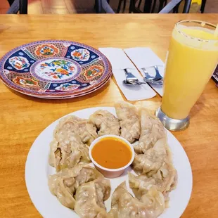 Chicken momo , mango Lassi