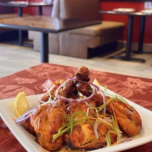 A classic favorite, our Tandoori Chicken is marinated in yogurt, spices, and herbs, then cooked in a traditional clay oven.