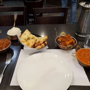Chicken curry, matter paneer, aloo Gobi, rice, naan.