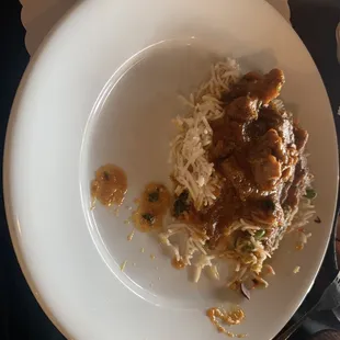 The Himalayan Goat Curry, spicy and so flavorful. If the spice is tamed down it&apos;s not good. Perfect here.
