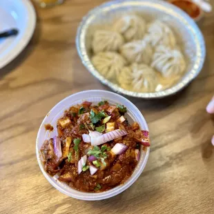 Beef Chilli (bottom) and Chicken Momo (top)