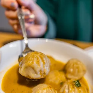 Chicken Momo w/ jhol ($13) off-the-menu