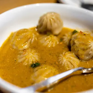 Chicken Momo w/ jhol ($13) off-the-menu