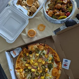 Royal paneer pizza with spicy sauce, vegetarian fried Momos and chilli chicken Momos! Delicious!