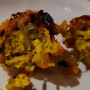 Interior of pyaazi ($6.50), vegan by default. Tasty fried onion snack.