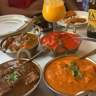 a table full of indian food