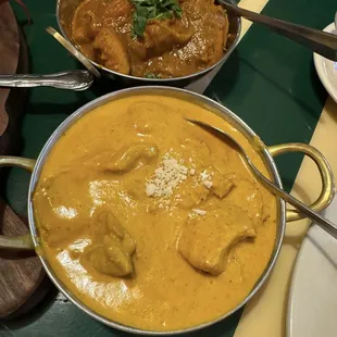 Chicken curry (yellow) and chicken korma (brown)