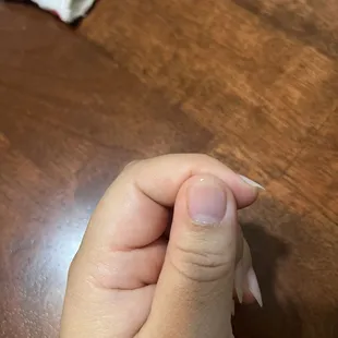 Filled down thumb weirdly, almond shape.