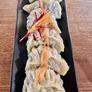 Momos with chicken $16