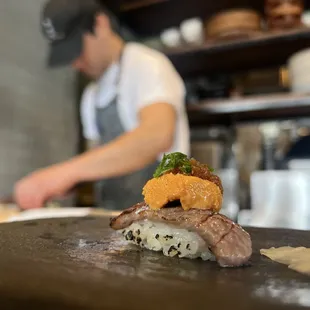 a chef preparing food in a kitchen