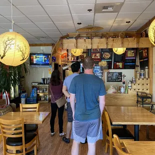 a man and a woman in a restaurant