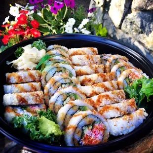 Two jumbo Crunchy California rolls! Such a beautiful family-size dinner platter!