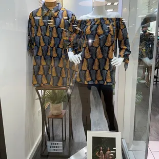 Window display of a couples wardrobe